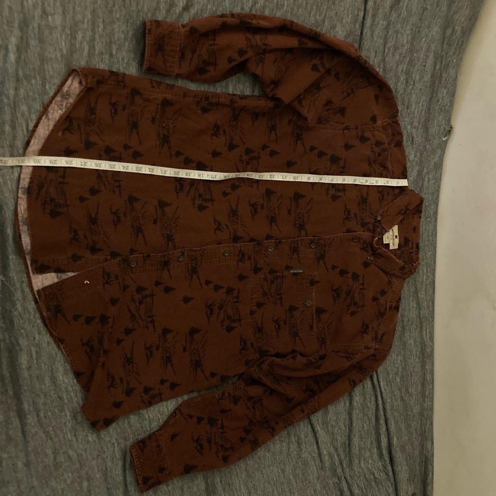 Brown woolrich nature flannel size large with pocket on the chest